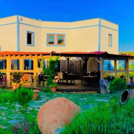 Sukha Inn Hotel & Beach 보즈자아다 외부 사진