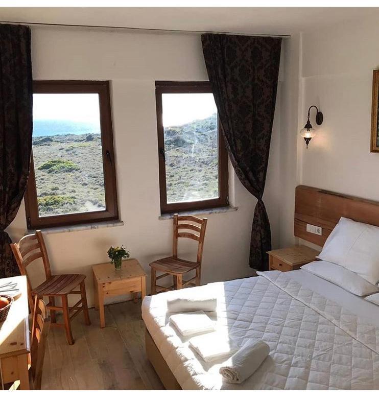 Sukha Inn Hotel & Beach 보즈자아다 외부 사진