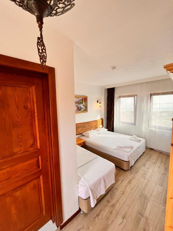 Sukha Inn Hotel & Beach 보즈자아다 외부 사진