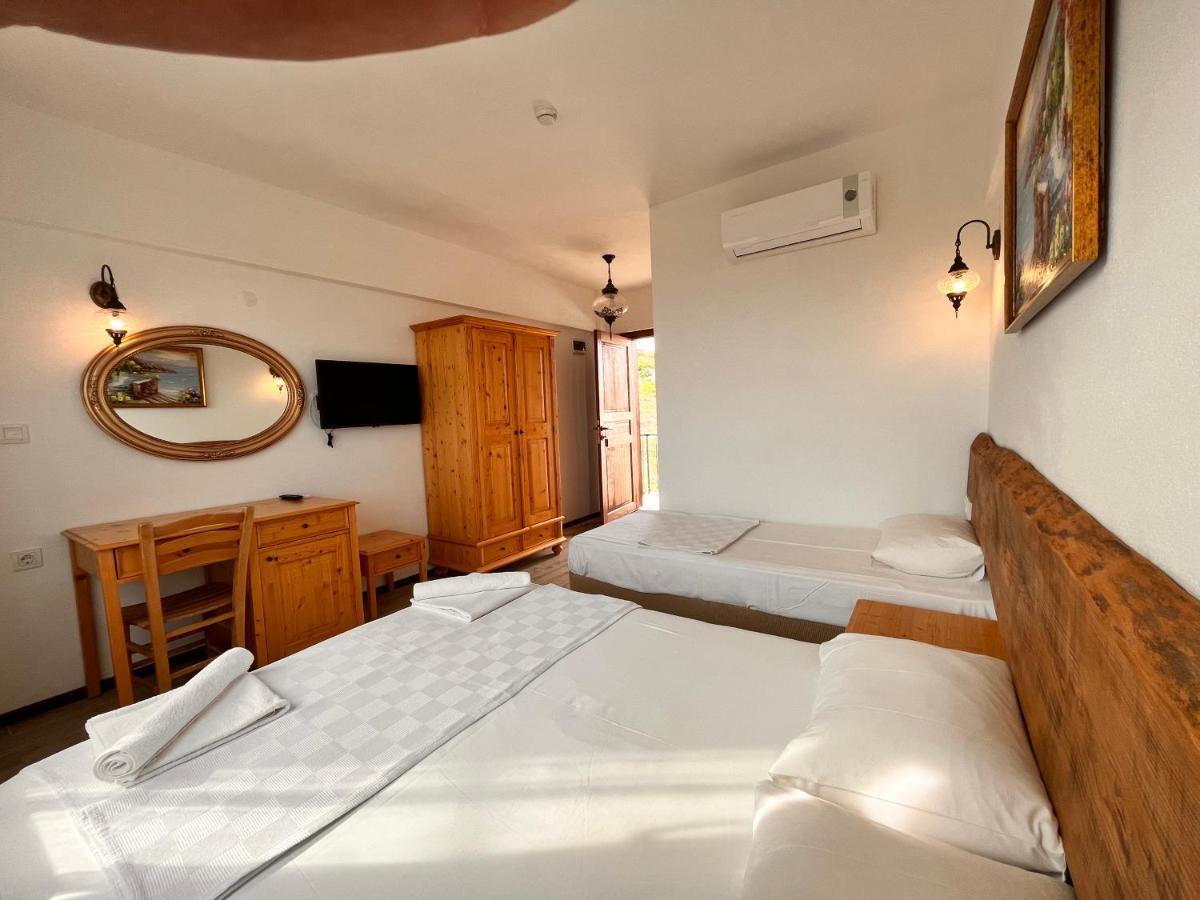Sukha Inn Hotel & Beach 보즈자아다 외부 사진