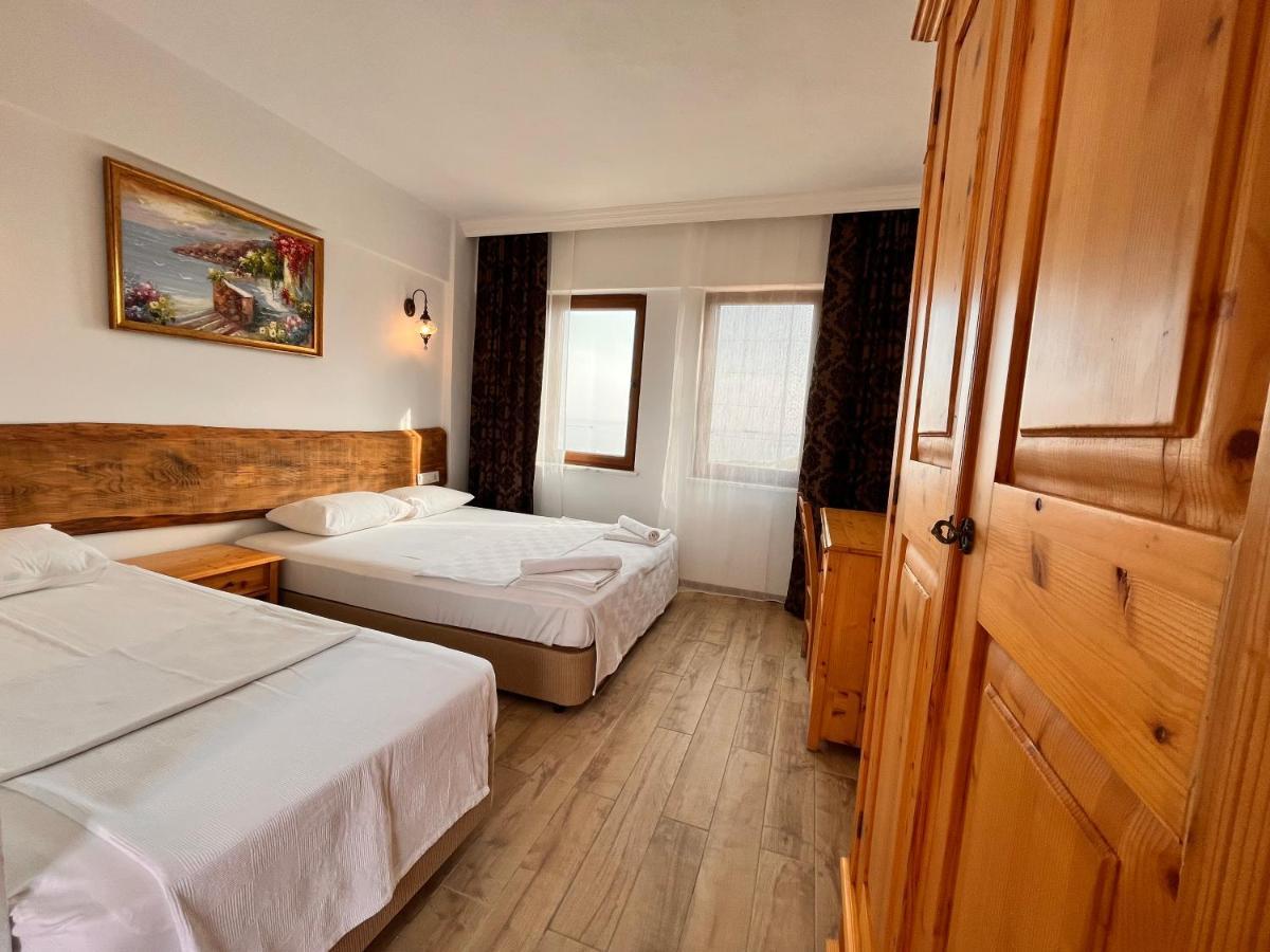 Sukha Inn Hotel & Beach 보즈자아다 외부 사진